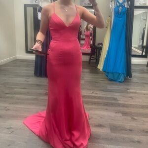 Size 2 coral dress, 100% polyester brand new.  Brand is Faviana